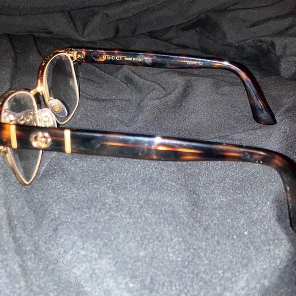 Gucci Black and Gold Frame Glasses
